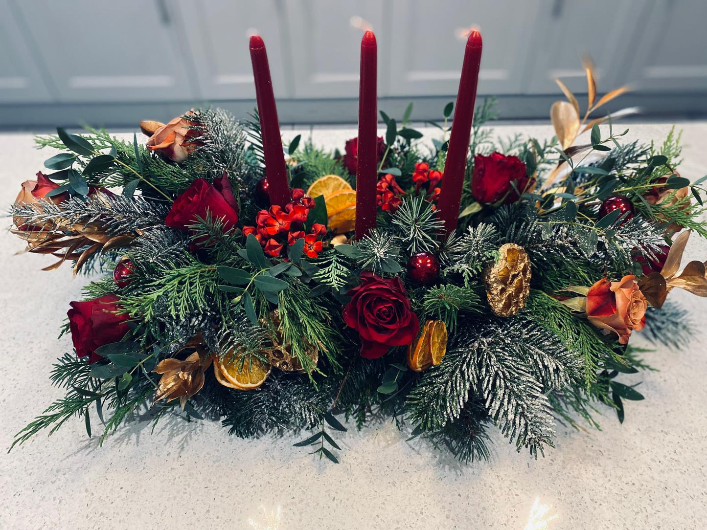 Christmas table arrangement with flowers