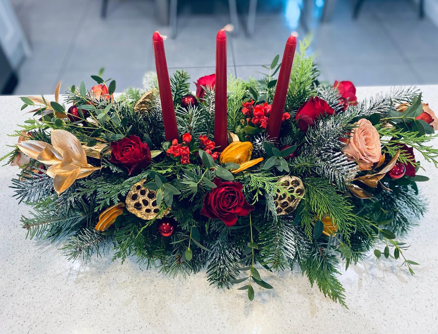 Christmas table arrangement with flowers