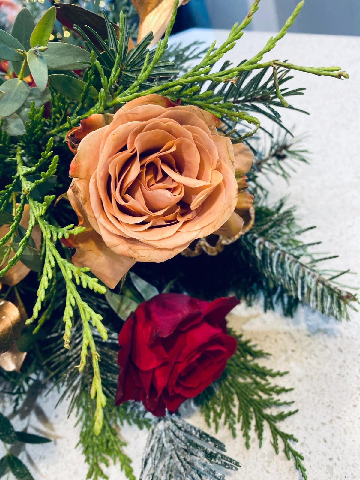 Christmas table arrangement with flowers