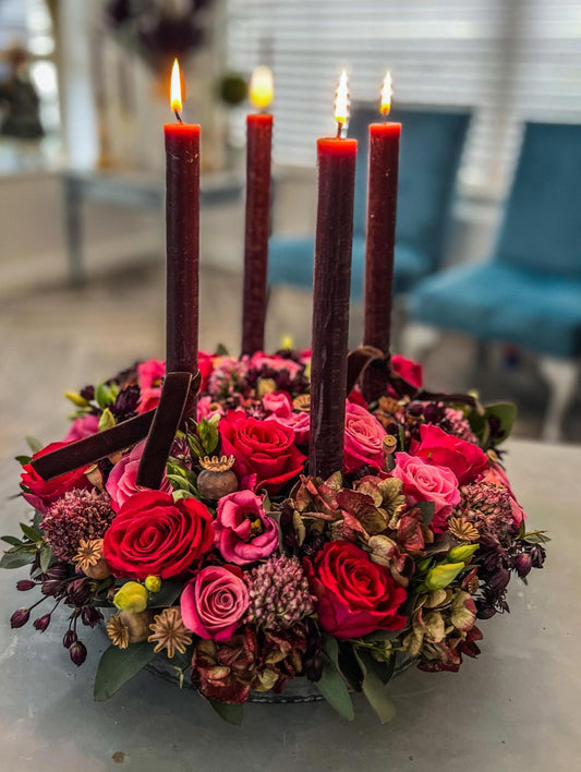 Dinner table arrangement with candles